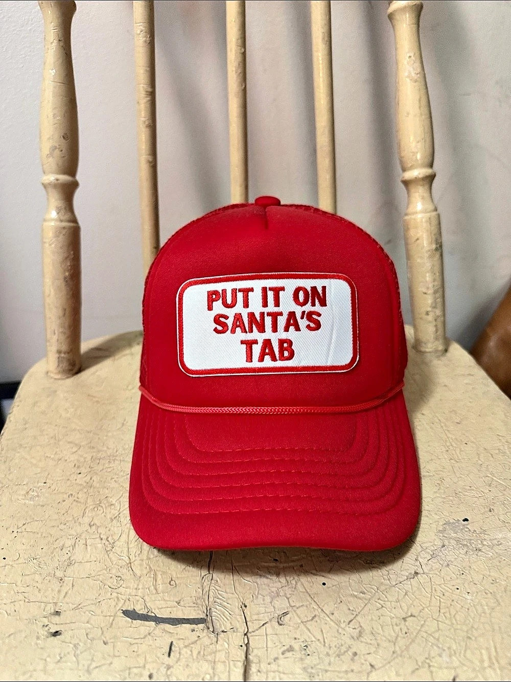 Put It On Santa's Tab Trucker Hat Red
